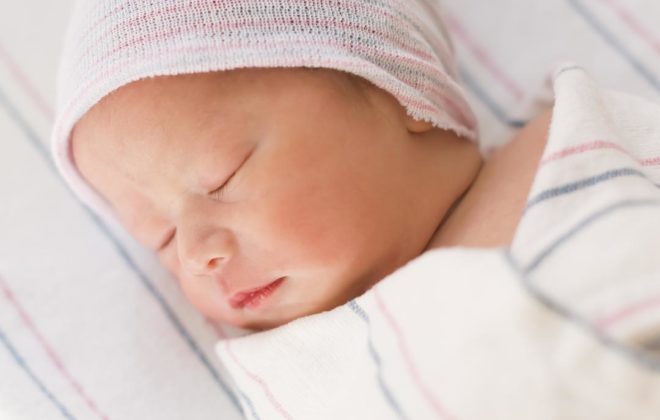 Baby asleep in swaddle