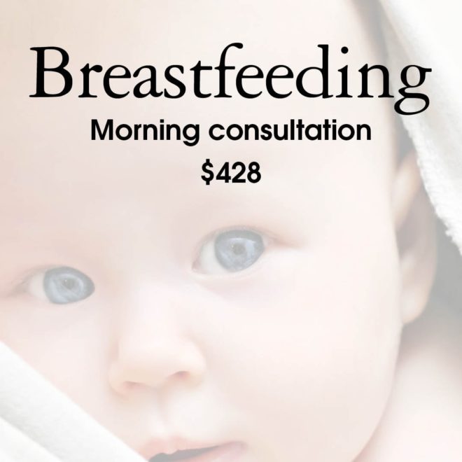 Baby cuddling mother