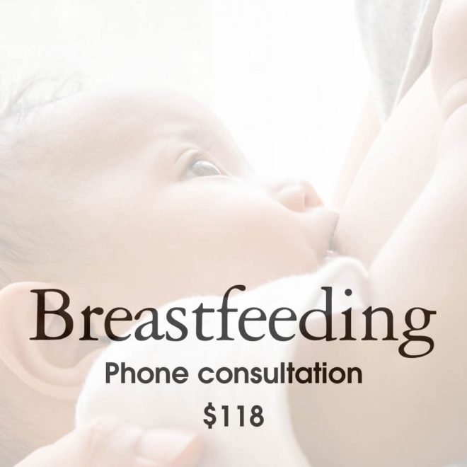 Close up image of woman breastfeeding baby
